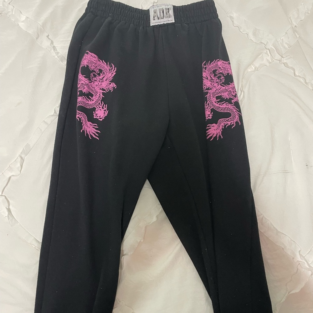 adika sweats with pink dragon details size M